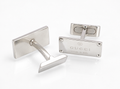 Vintage Gucci sterling silver cufflinks showing the engraved rectangular heads and articulated toggle backs