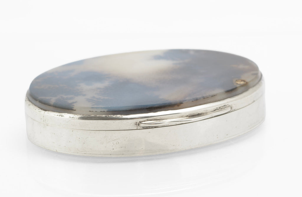 Antique sterling silver oval moss agate box shown closed from the front with friction fit closure