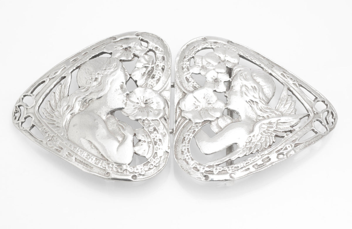 Reverse view of the joined vintage sterling silver nurses style belt buckle showing the belt fittings