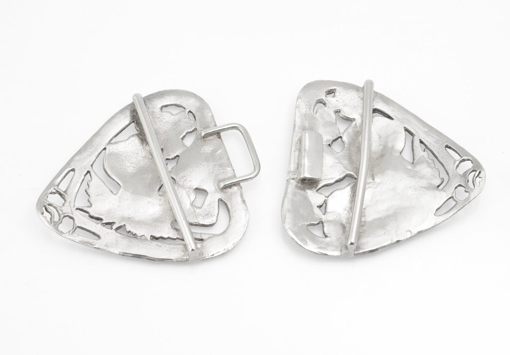 Angled reverse view of the vintage sterling silver nurses belt buckle showing the hook, loop and long bars