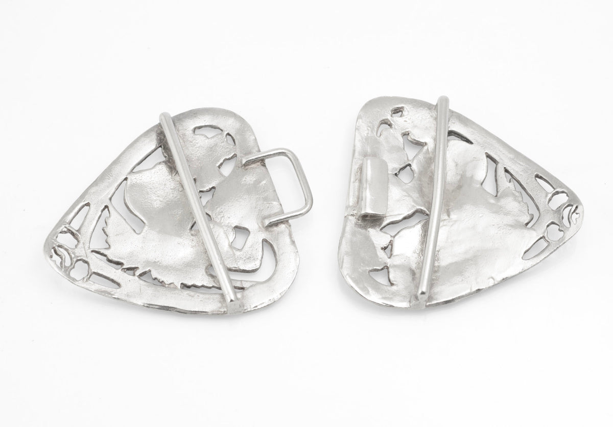 Angled reverse view of the vintage sterling silver nurses belt buckle showing the hook, loop and long bars