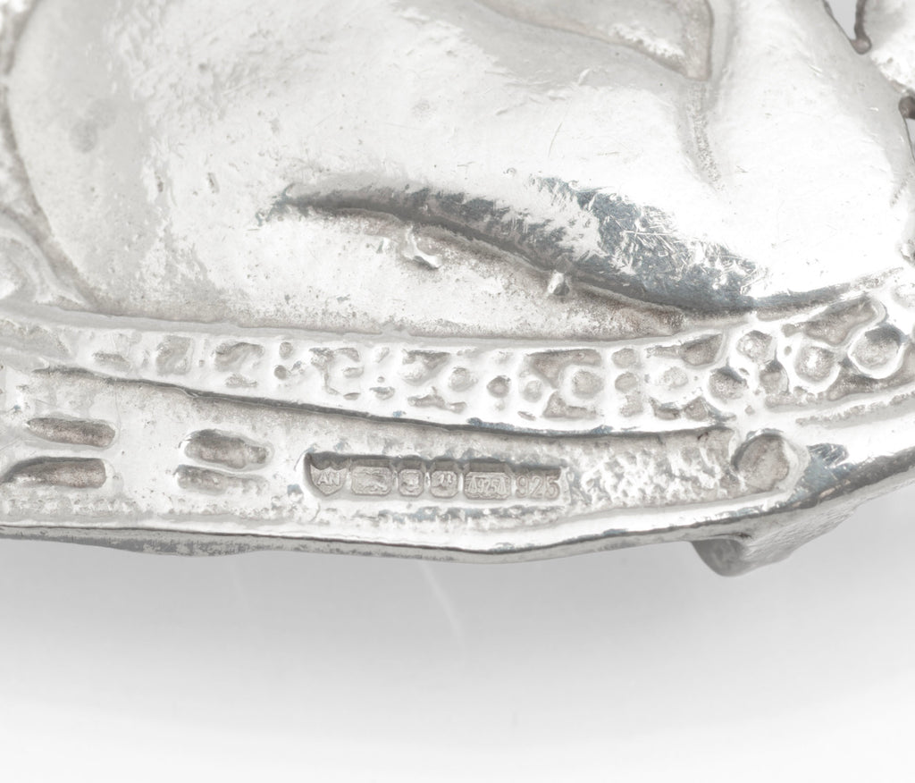 Reverse view of the two sterling silver nurses belt buckle sections showing the conventional fittings
