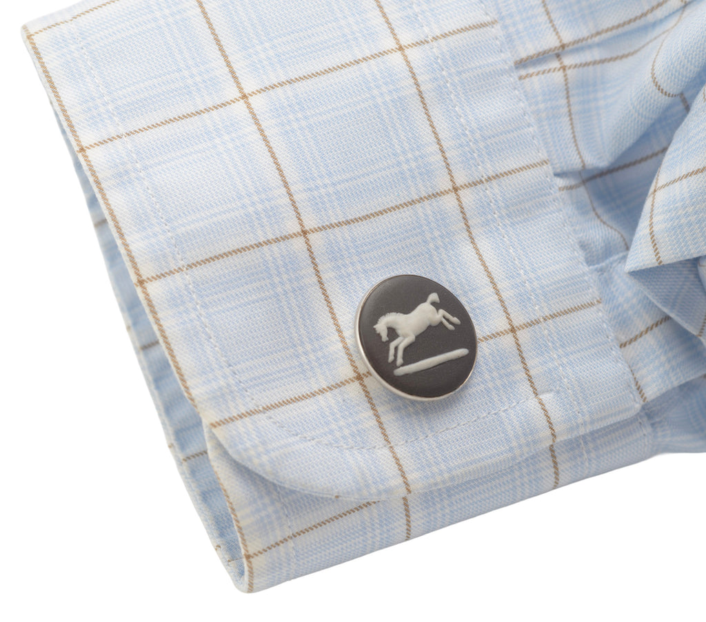 Vintage Wedgwood black jasperware horse cufflink worn on a shirt cuff
