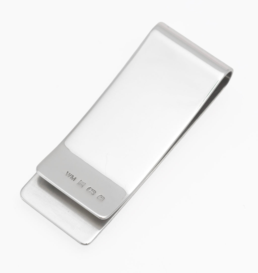 Alternate view of vintage William Manton sterling silver money clip showing the plain polished reverse and hallmark
