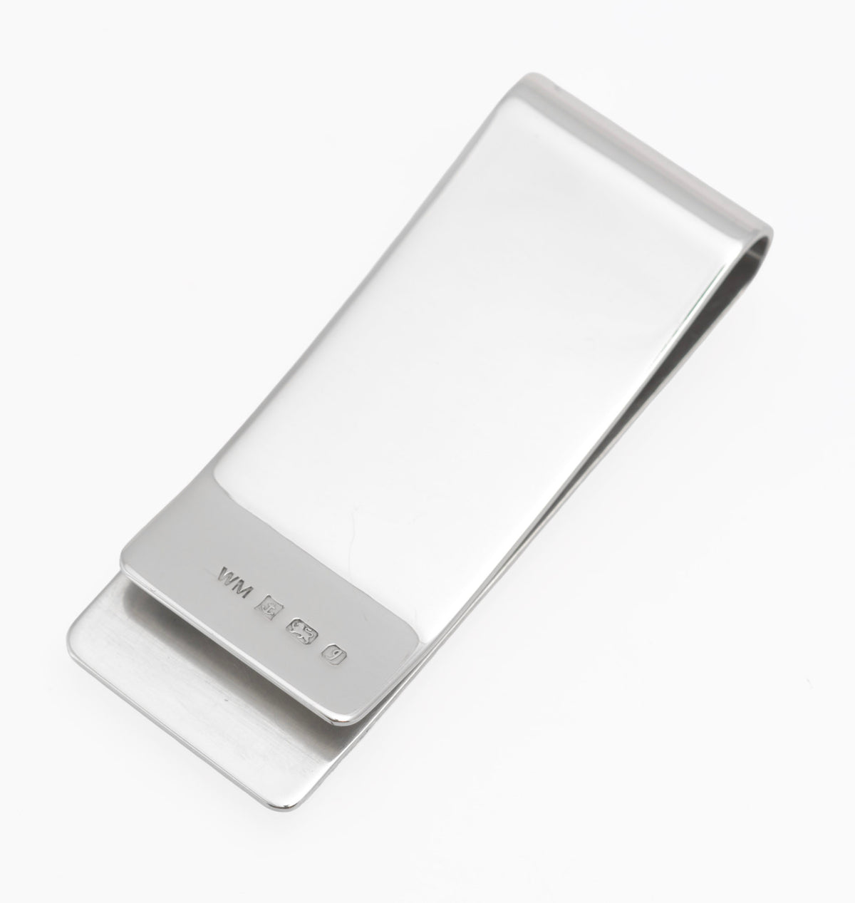 Alternate view of vintage William Manton sterling silver money clip showing the plain polished reverse and hallmark