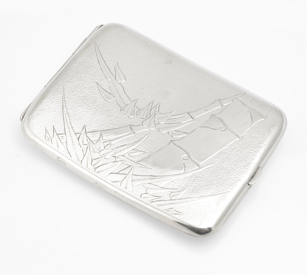 Open view of an antique Chinese export sterling silver cigarette case with bamboo engraving