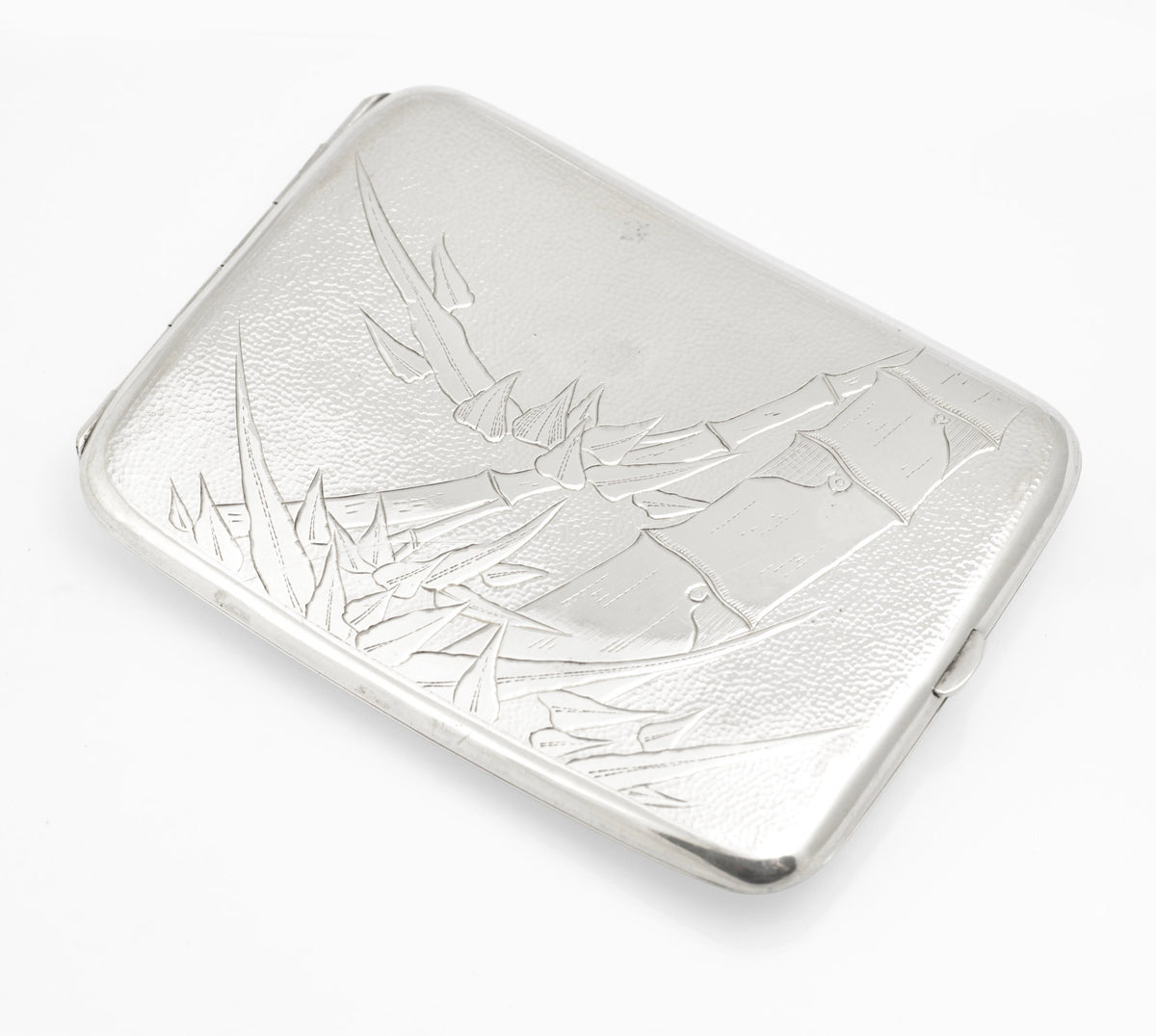 Open view of an antique Chinese export sterling silver cigarette case with bamboo engraving