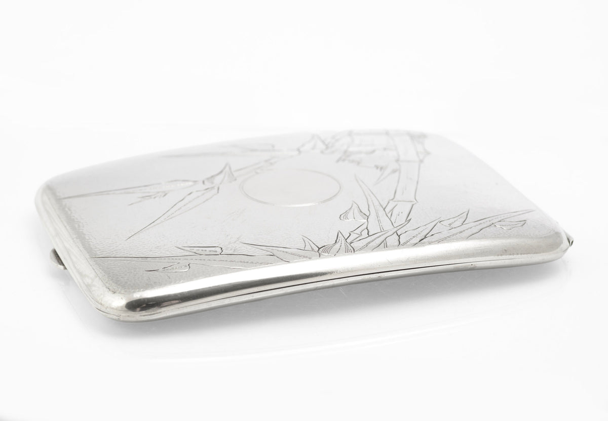 Antique Chinese export sterling silver cigarette case closed showing engraved bamboo on a stippled ground