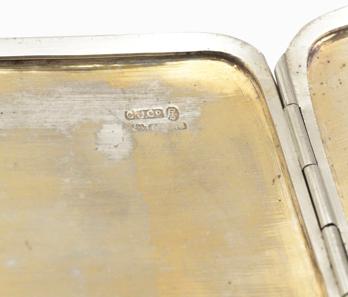 Alternate closed view of an antique Chinese export sterling silver cigarette case with engraved bamboo