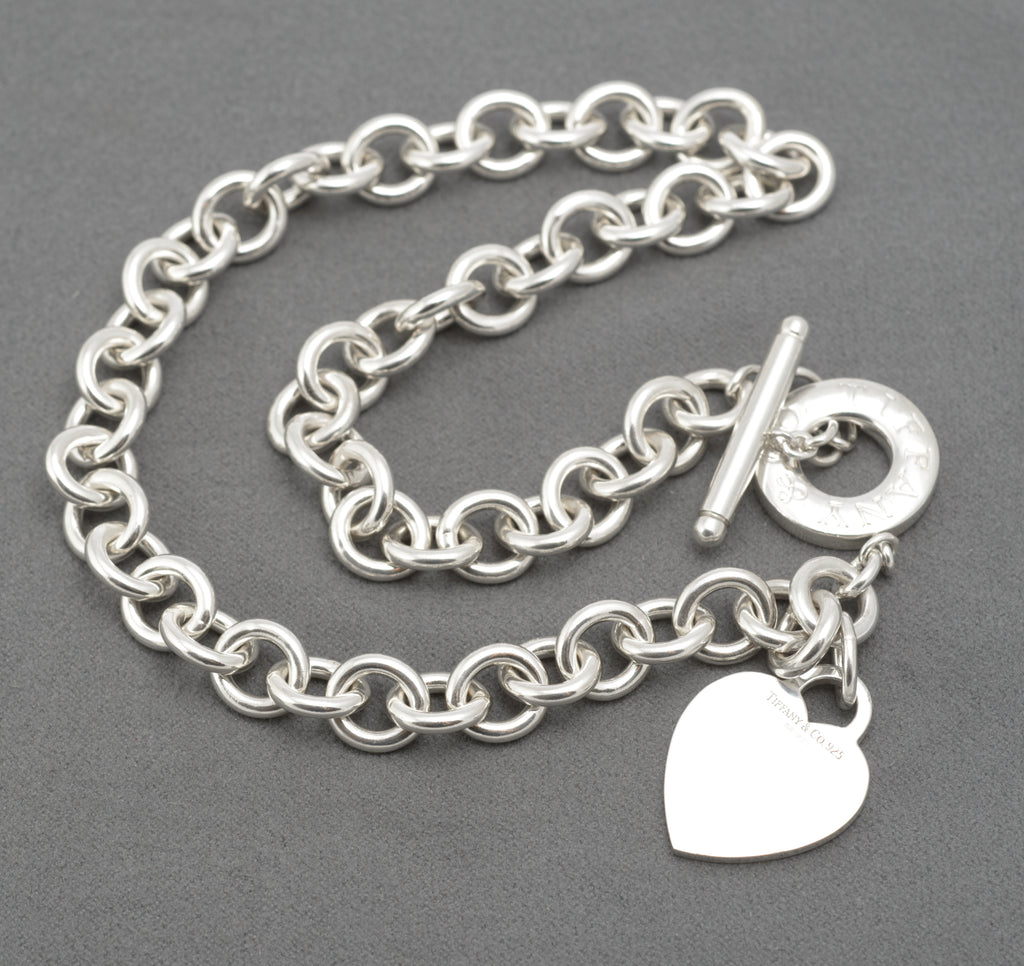 Full view of vintage Tiffany and Co sterling silver Heart Tag necklace showing the T bar and toggle disc fastening