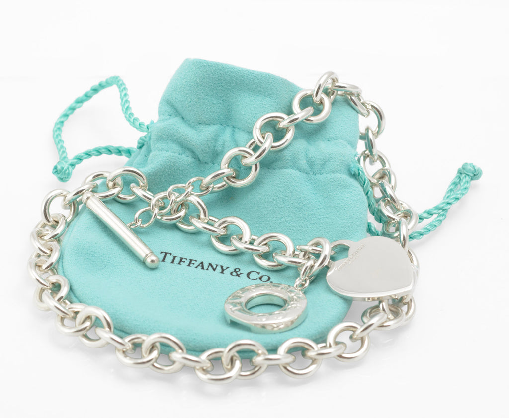Vintage Tiffany and Co sterling silver Heart Tag necklace with circular links, heart tag, toggle fastening and Tiffany soft pouch