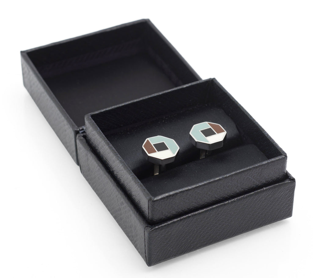 Front view of vintage Prada sterling silver cufflinks with octagonal enamelled faces in muted green, brown, black and cream