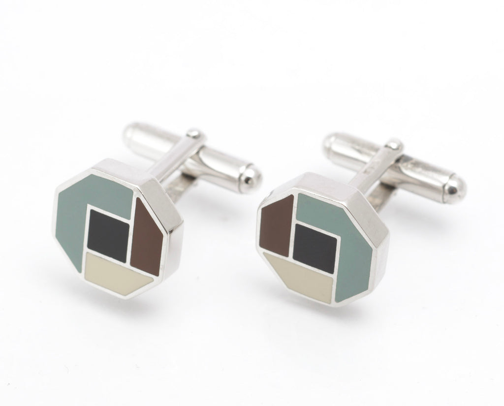 Close rear view of vintage Prada sterling silver cufflinks showing PRADA marks to the backs of the heads