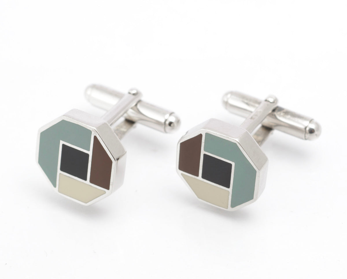 Close rear view of vintage Prada sterling silver cufflinks showing PRADA marks to the backs of the heads