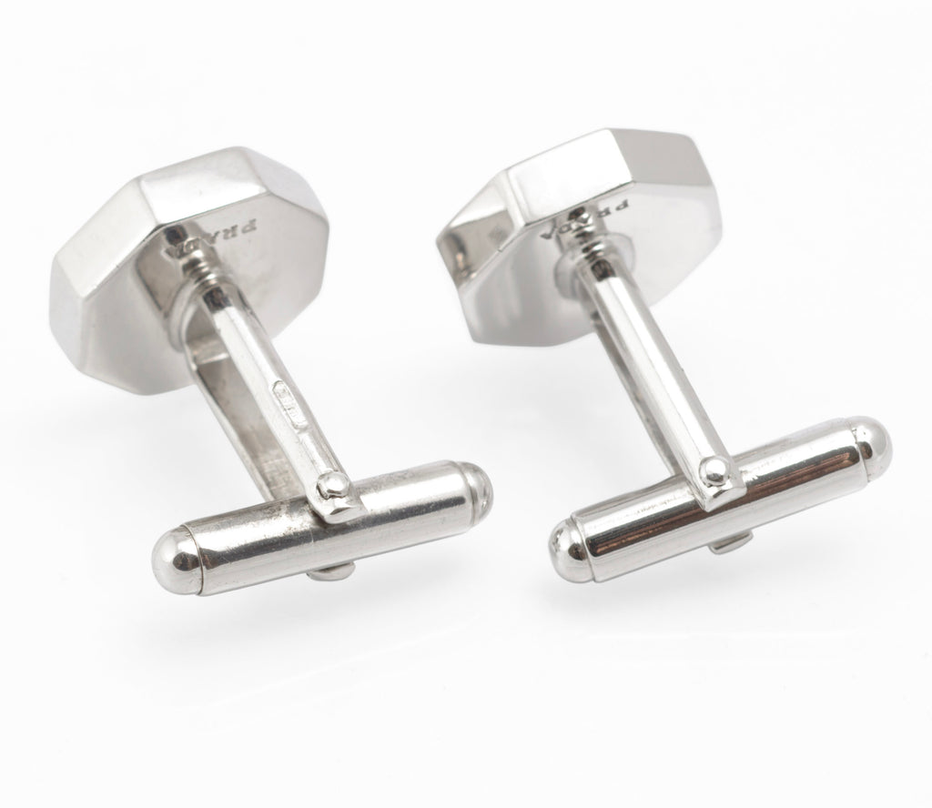 Vintage Prada geometric enamel cufflink shown worn on a shirt cuff
