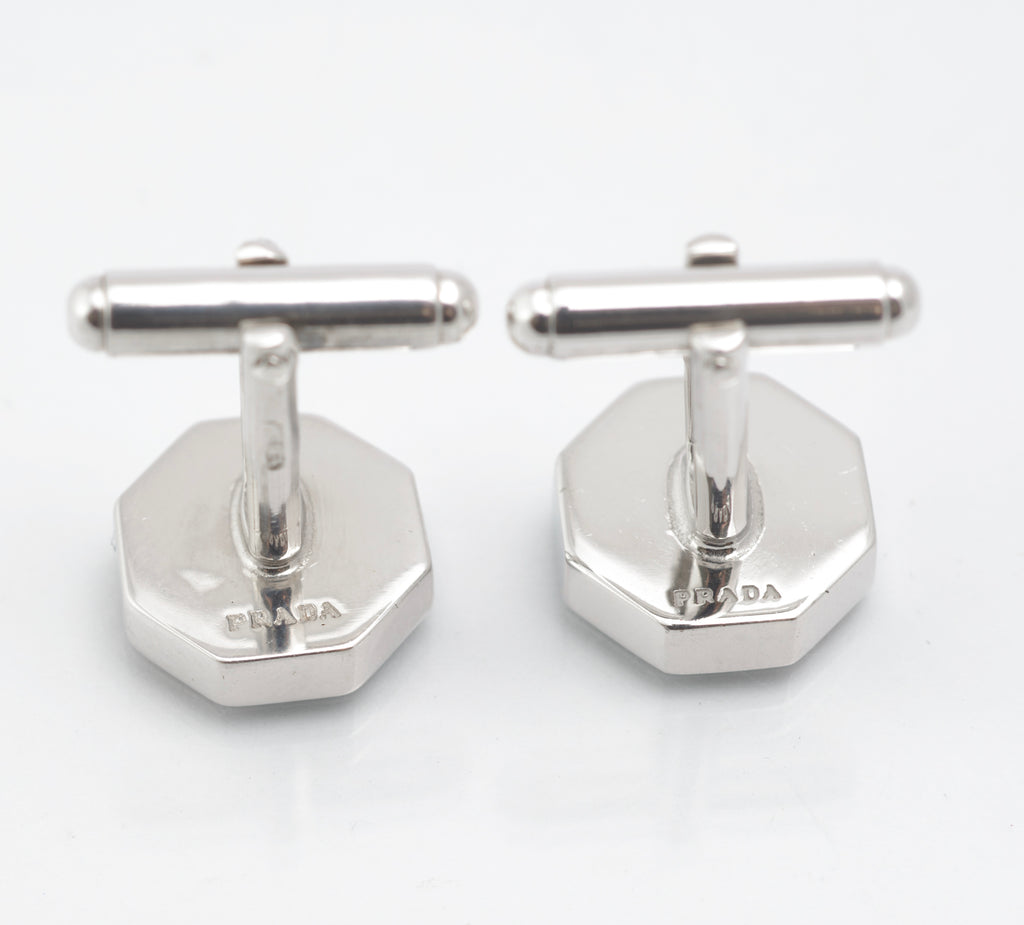 Vintage Prada sterling silver geometric enamel cufflinks displayed in the original black presentation box