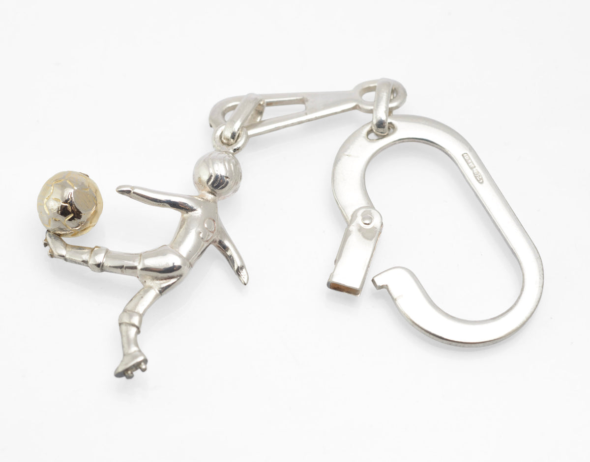 Vintage Italian sterling silver footballer keyring with gilt finished football and broad spring clip