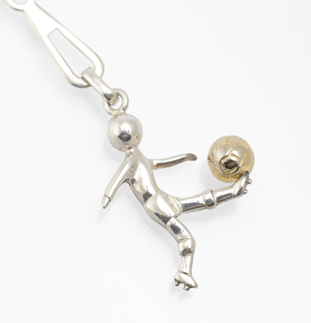 Full view of vintage Italian sterling silver footballer keyring showing the spring clip, chain and suspended footballer