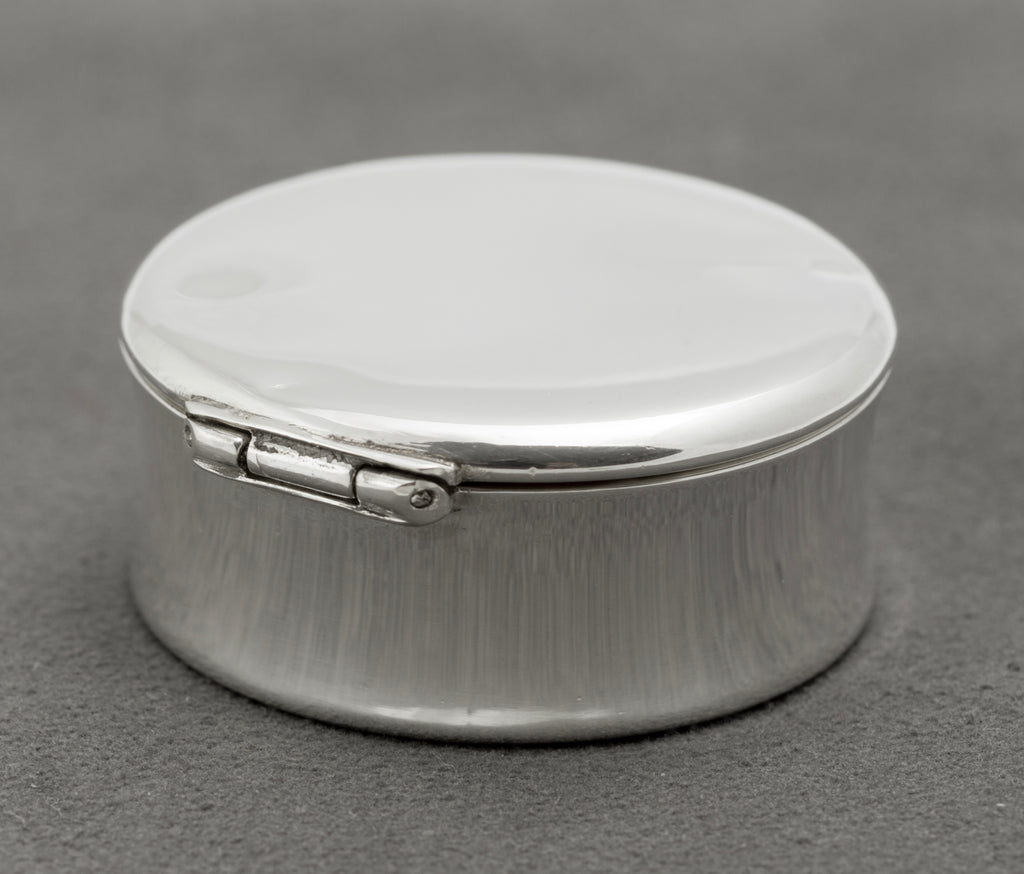 Close view of the working hinge on the vintage Tiffany & Co sterling silver pill box