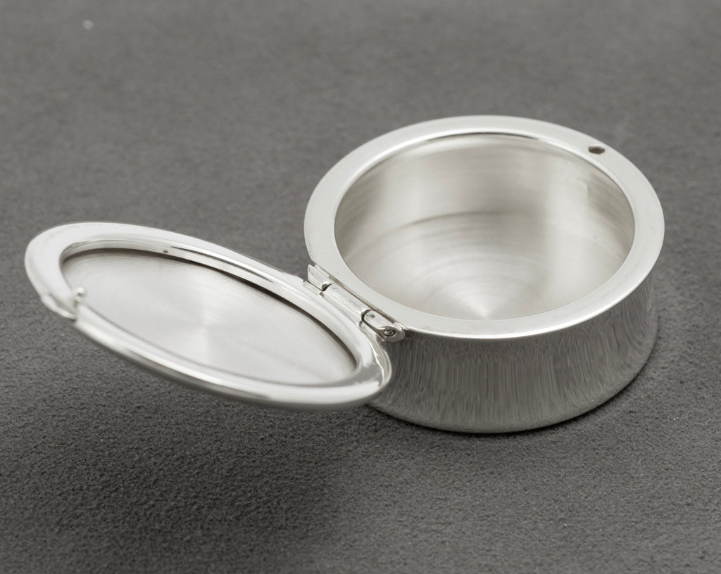 Open Tiffany & Co 1837 sterling silver pill box showing the interior, rim and hinge