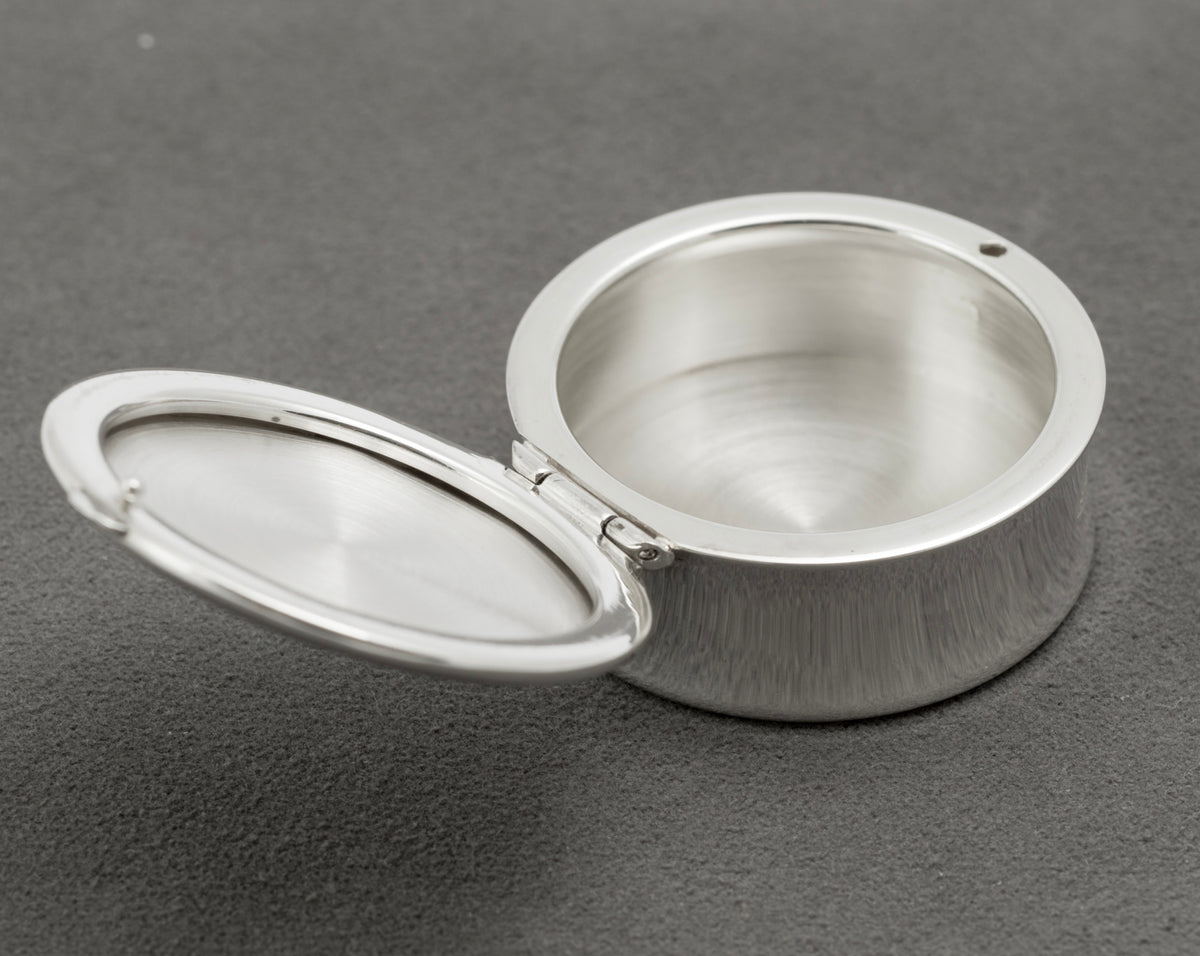 Open Tiffany & Co 1837 sterling silver pill box showing the interior, rim and hinge