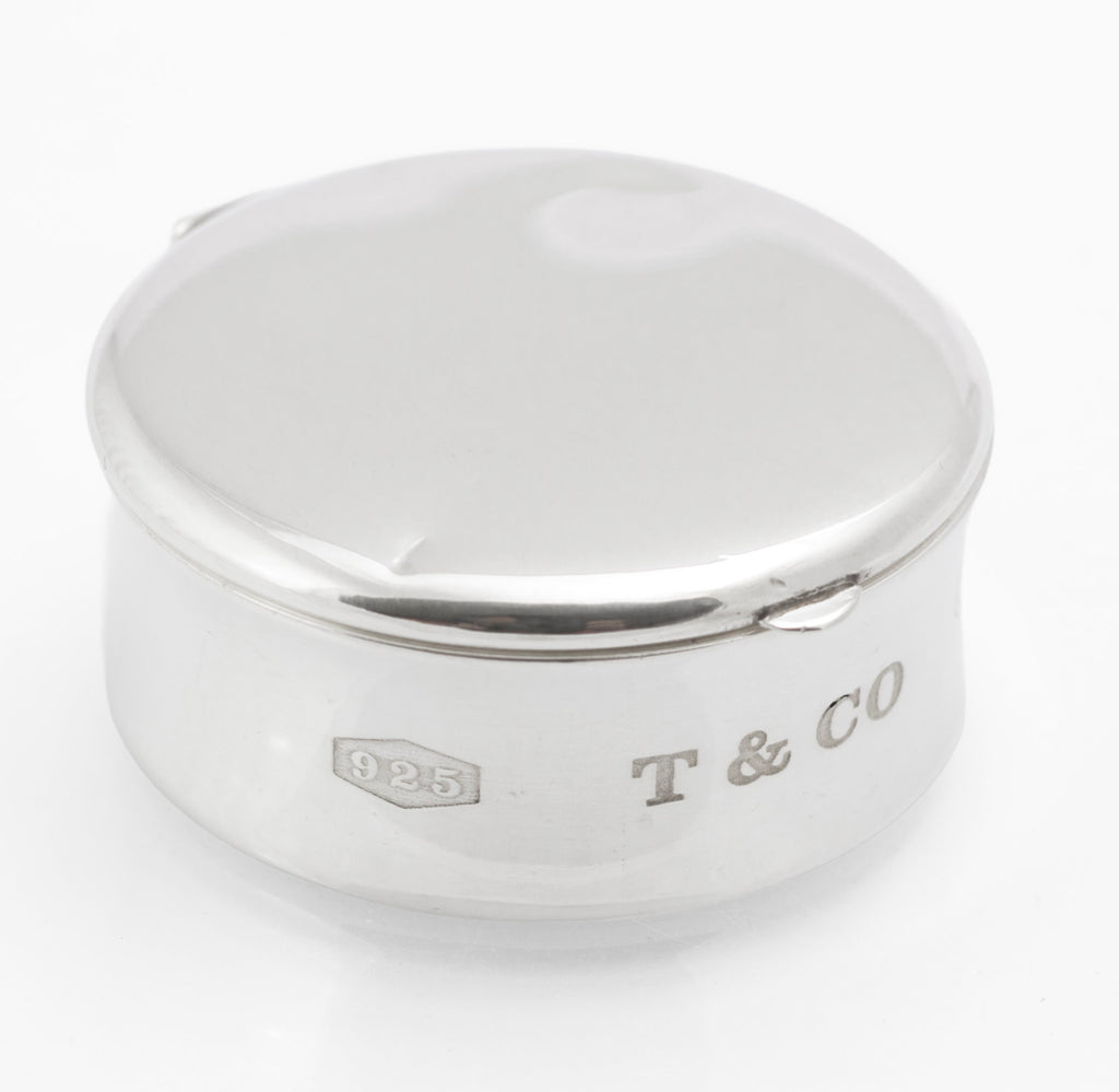 Underside view of Tiffany & Co sterling silver pill box showing the © 2001 Tiffany & Co 925 Spain engraving