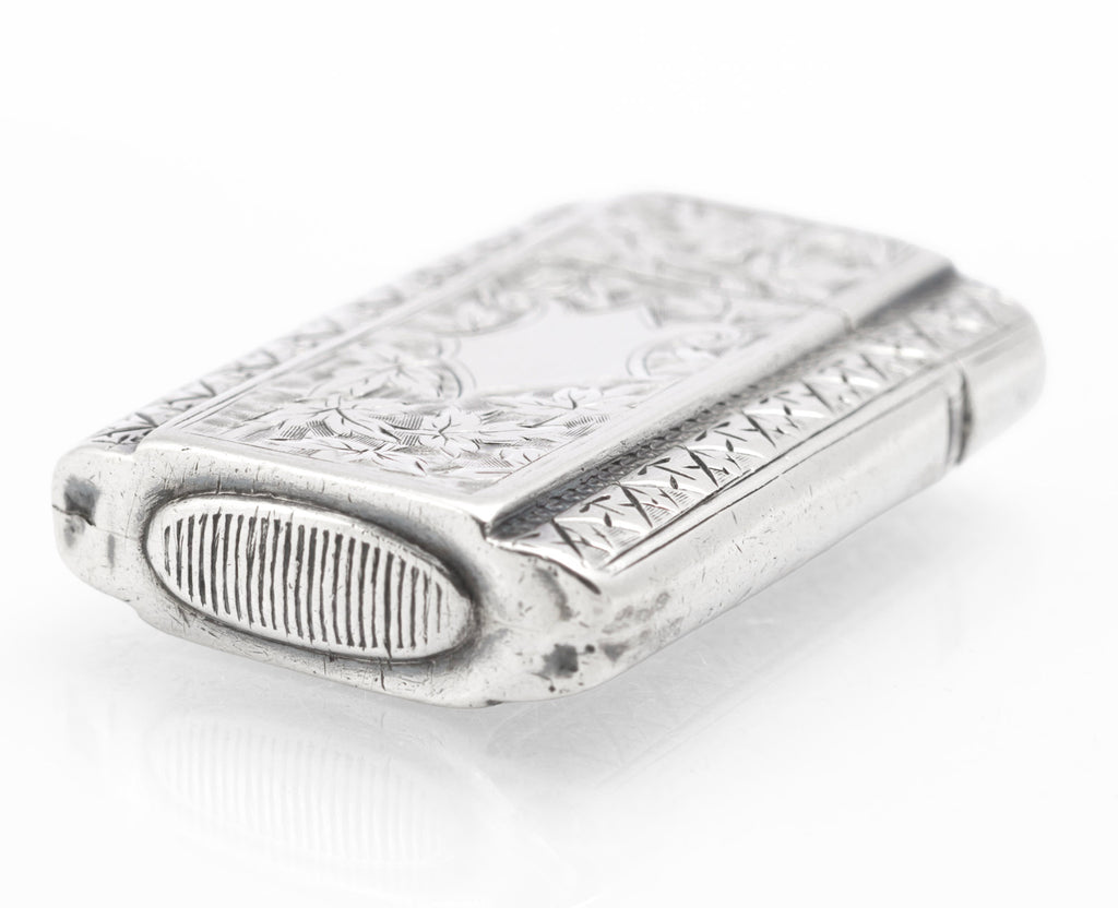 Close view of the ribbed striker incorporated into the base of the Victorian silver vesta case
