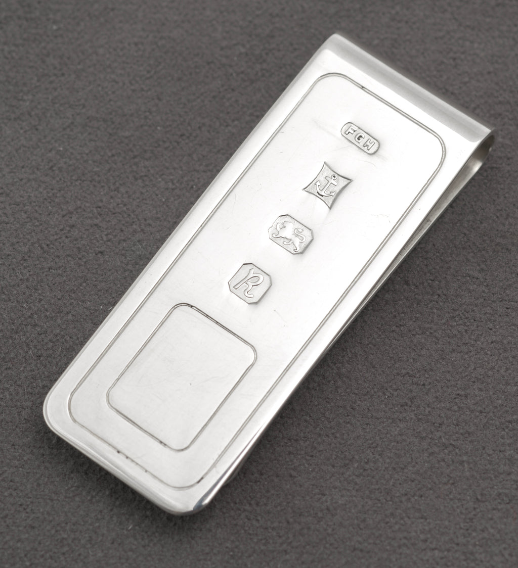 Reverse view of the polished vintage sterling silver money clip showing its smooth curved fold