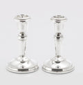 Pair of vintage sterling silver candlesticks by W I Broadway and Co with beaded borders and weighted circular bases