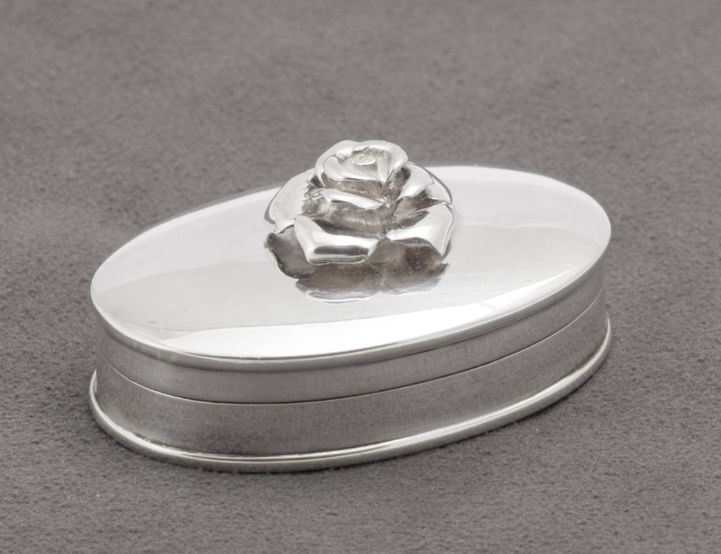 Underside of sterling silver oval pill box showing Sheffield 2002 hallmarks - C3109