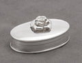 Underside of sterling silver oval pill box showing Sheffield 2002 hallmarks - C3109