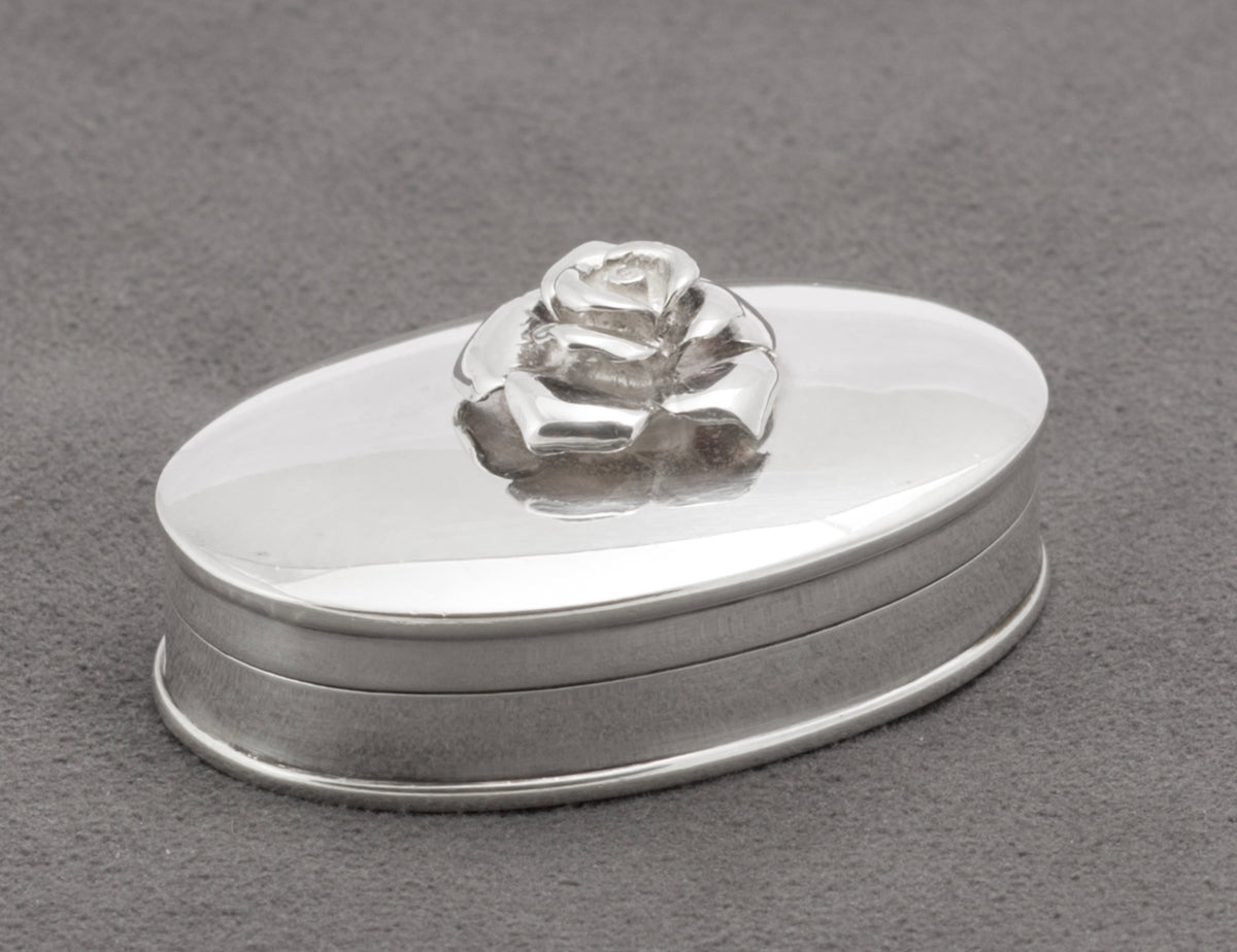 Underside of sterling silver oval pill box showing Sheffield 2002 hallmarks - C3109