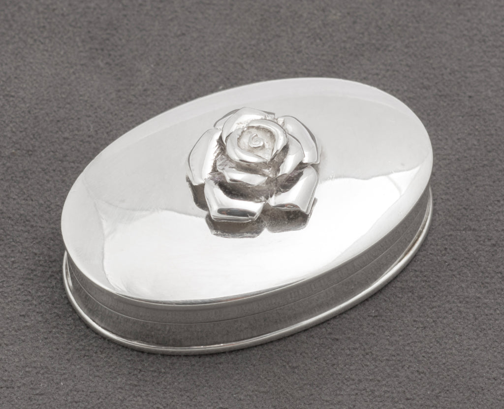 Sterling silver oval pill box with hinged lid open showing plain interior - C3109