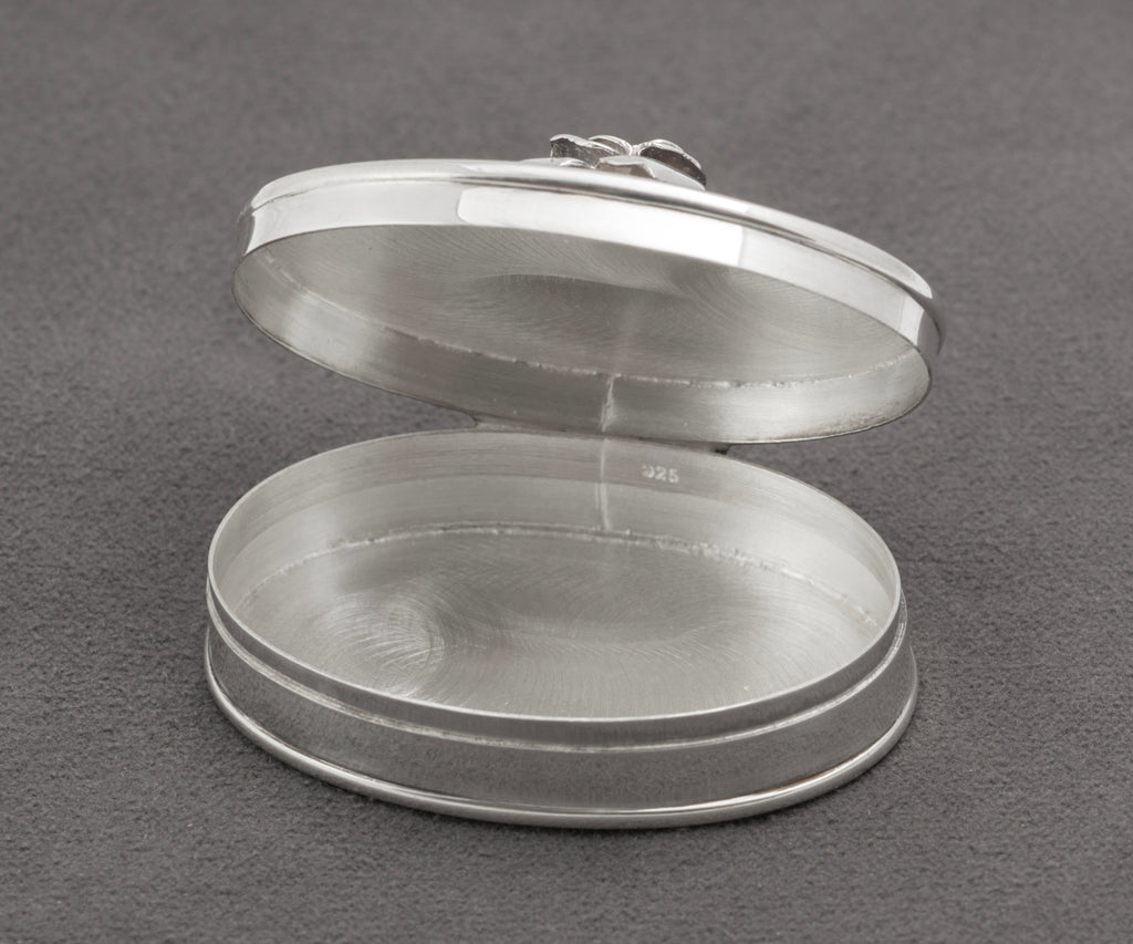 Side view of sterling silver oval rose pill box, Mark Houghton, Sheffield 2002 - C3109