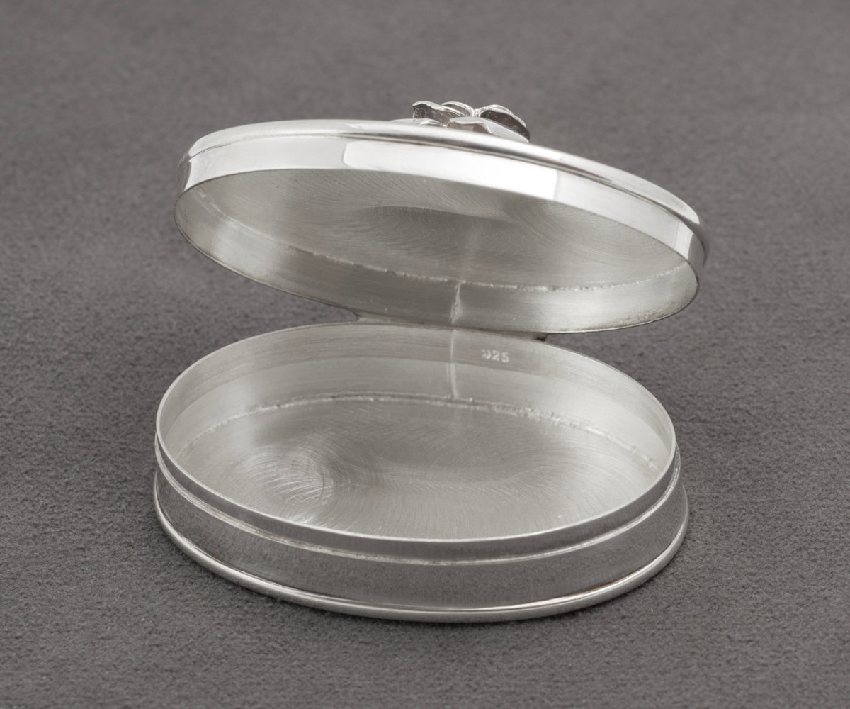 Side view of sterling silver oval rose pill box, Mark Houghton, Sheffield 2002 - C3109