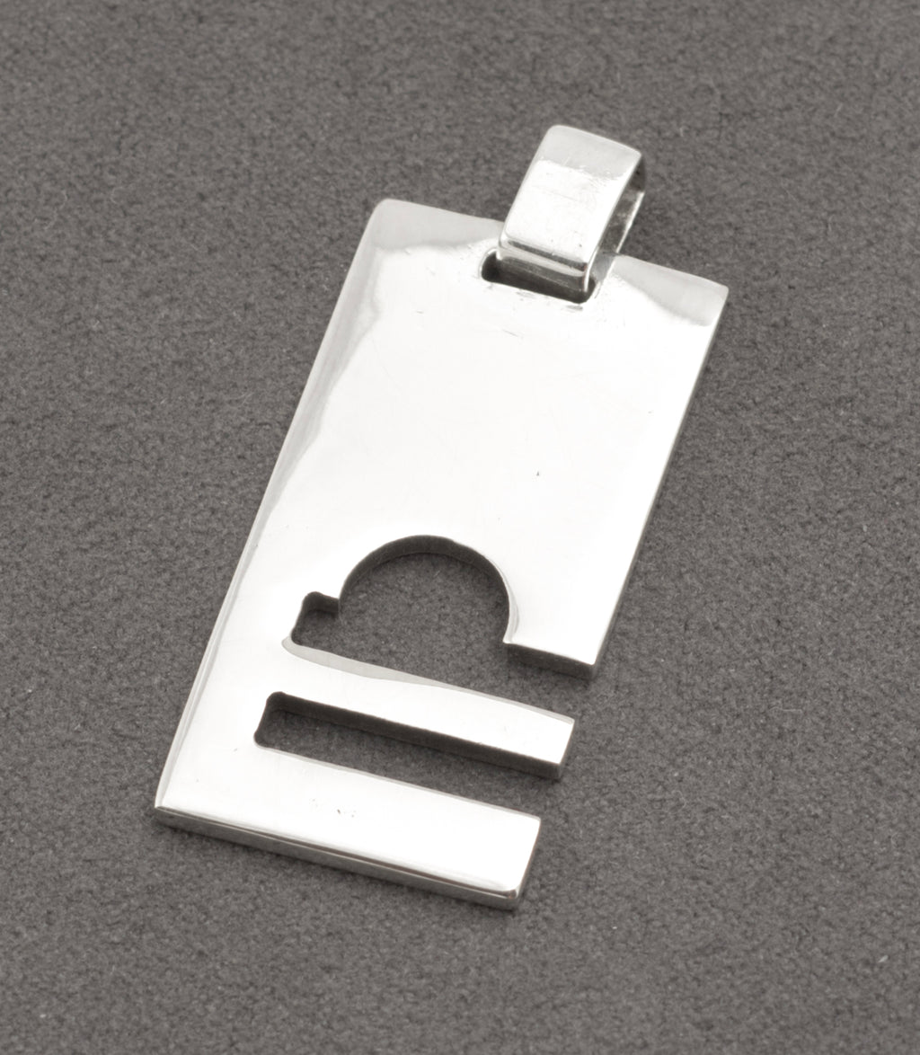 Gucci silver Libra pendant at an angle showing the broad integral loop and marks - C3110