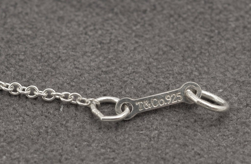 Tiffany silver Graffiti Kiss pendant necklace on white background - C3111