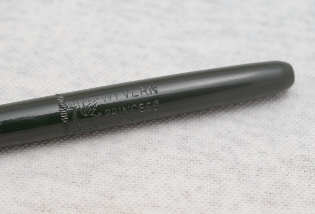 Matching Wyvern Princess fountain pen and mechanical pencil shown uncapped