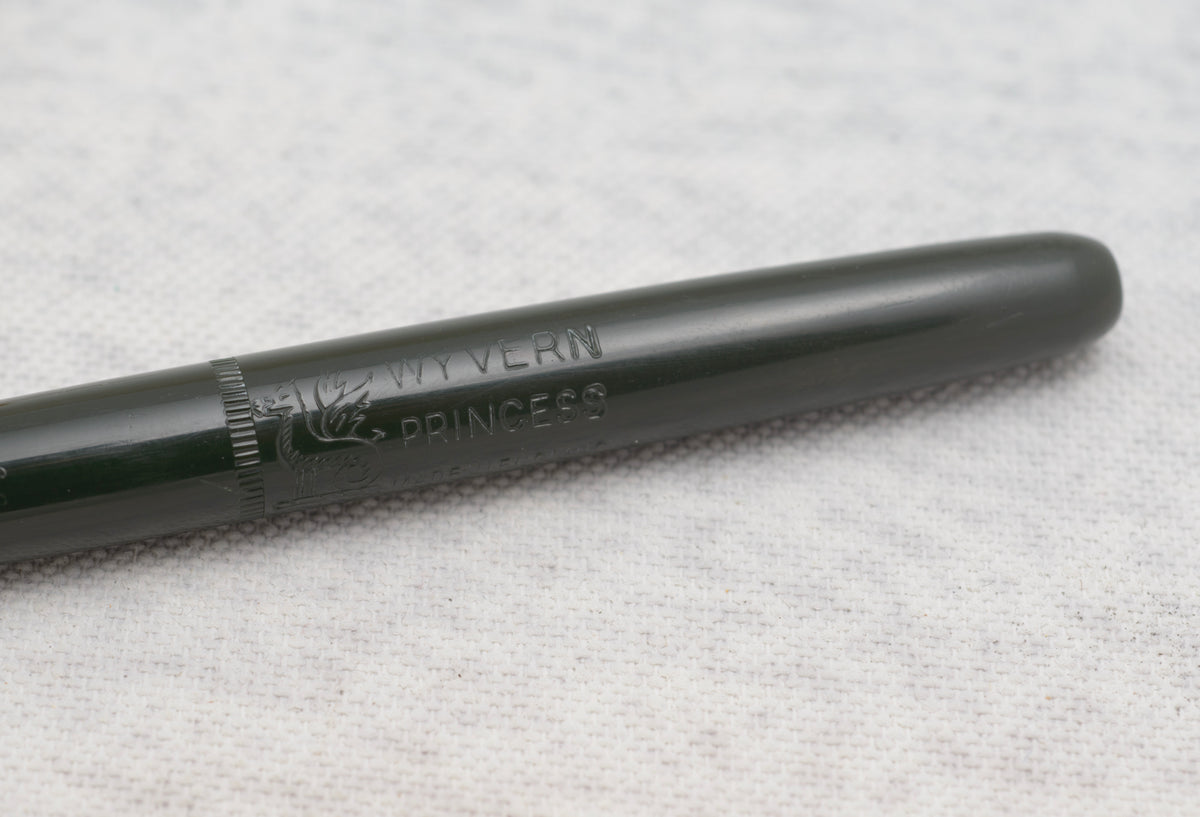 Matching Wyvern Princess fountain pen and mechanical pencil shown uncapped