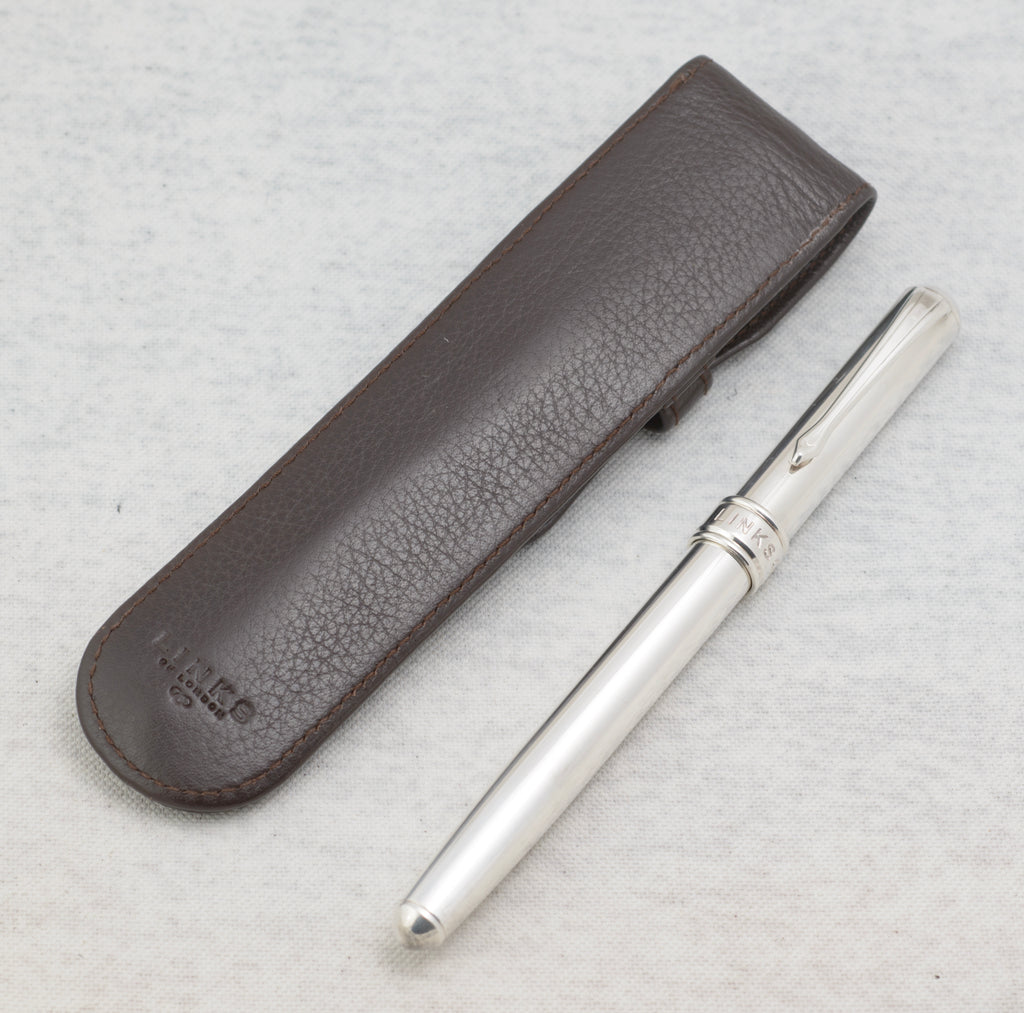 Links of London fountain pen with polished silver plated body, black grip and bi colour nib