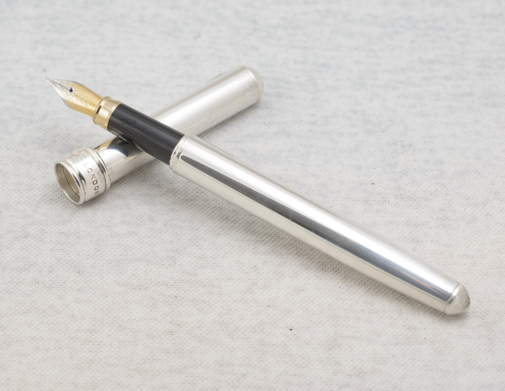 Close view of the bi colour fountain pen nib marked Iridium Point Germany
