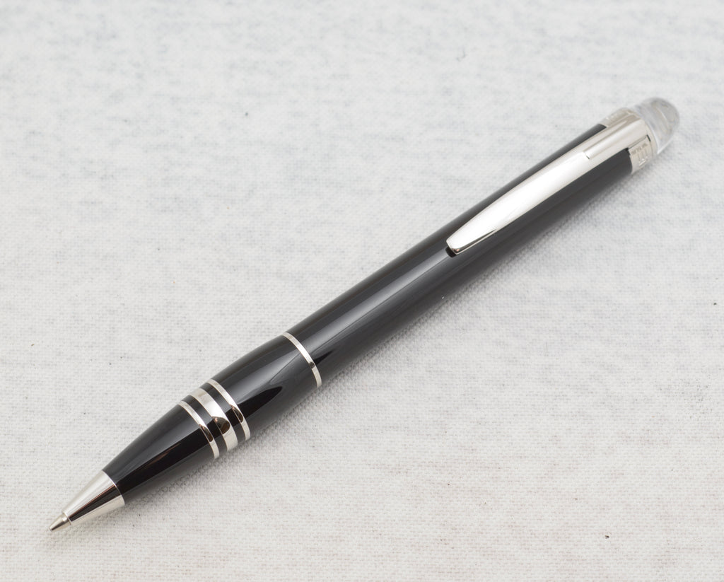 Closed black Montblanc presentation box with white emblem for the StarWalker pencil