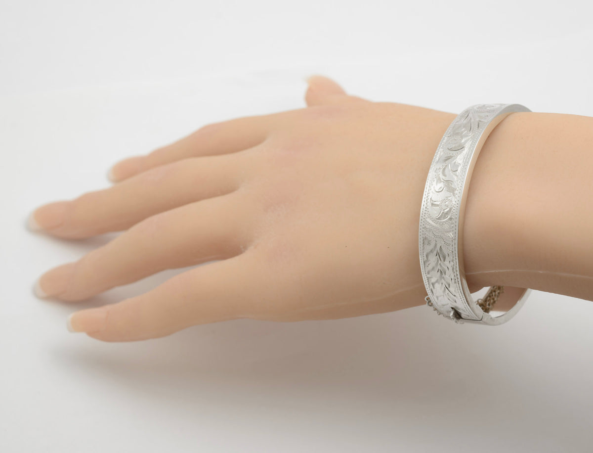 Interior Birmingham sterling silver hallmarks and maker's mark inside the bangle