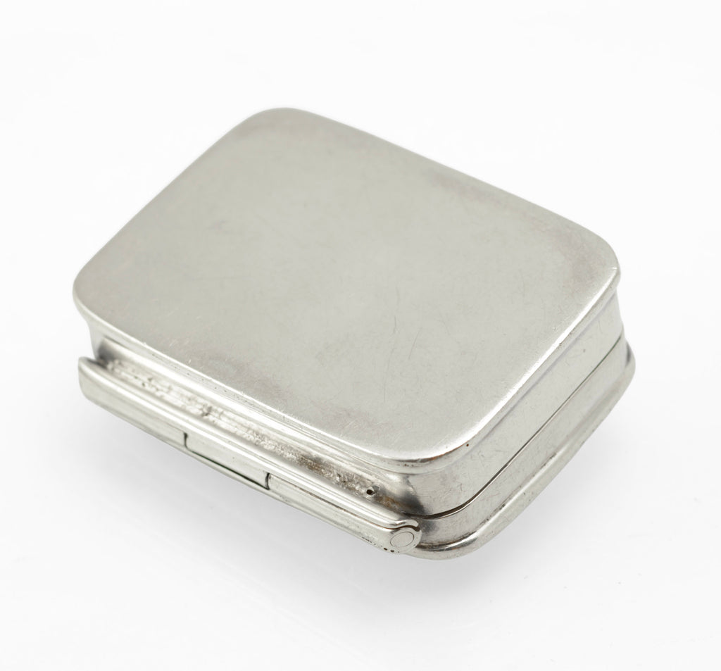 Open interior of the hinged sterling silver pill box