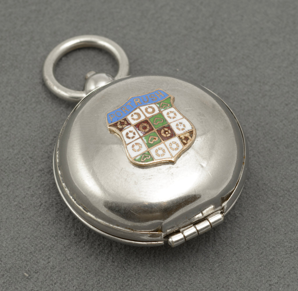 Open J.W. Benson sovereign holder showing the hinged cover, spring loaded carrier and suspension ring