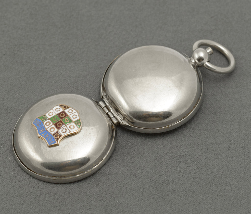 Close view of the spring loaded coin carrier inside the sovereign holder