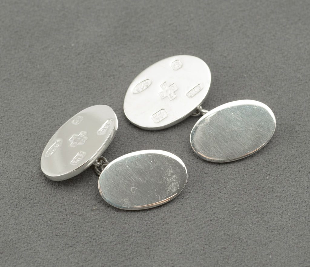 Closer view of the Birmingham 2000 millennium hallmark and BAO sponsor mark on the cufflink fronts