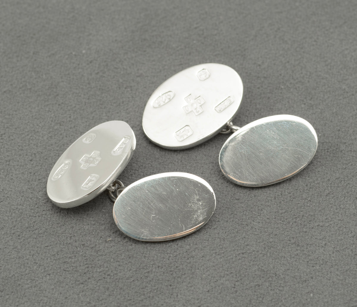 Closer view of the Birmingham 2000 millennium hallmark and BAO sponsor mark on the cufflink fronts