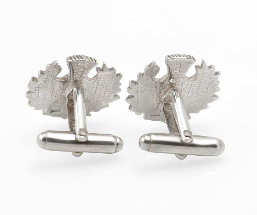 Back view of the cufflinks with the rotating toggle bars turned out