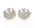 A pair of Scottish sterling silver thistle cufflinks by Celtic Art Industries, hallmarked Edinburgh 2002. The fronts are cast in relief as traditional Scottish thistles, with rotating bar fittings to the reverse.